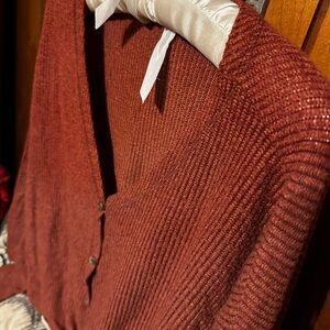 American Eagle Orange button down sweater
Size Medium